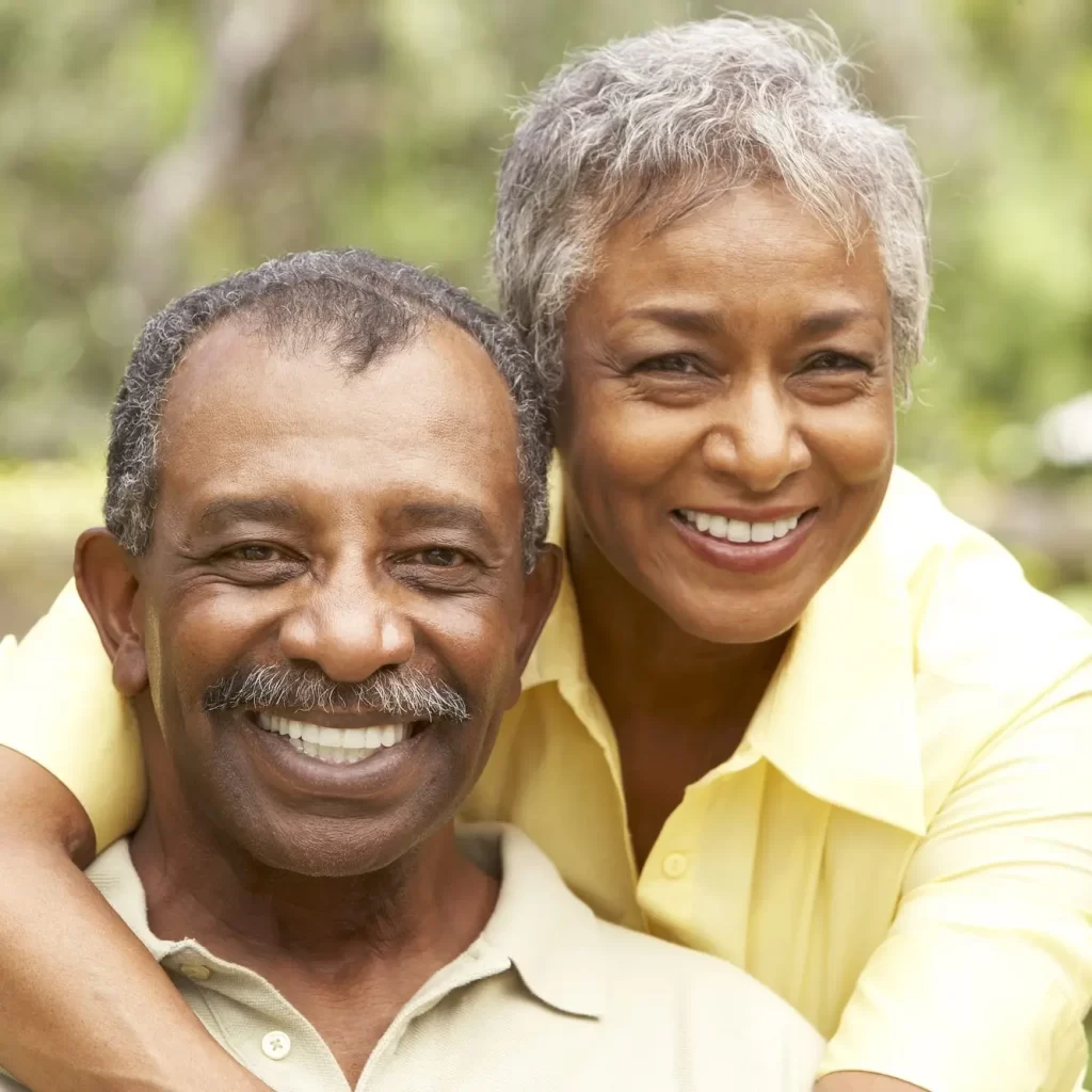 Senior Couple Relaxing In Garden