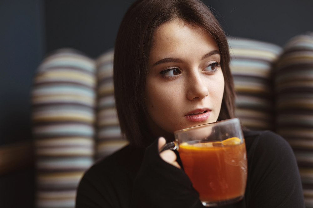 When can you drink hot liquids after a tooth extraction?